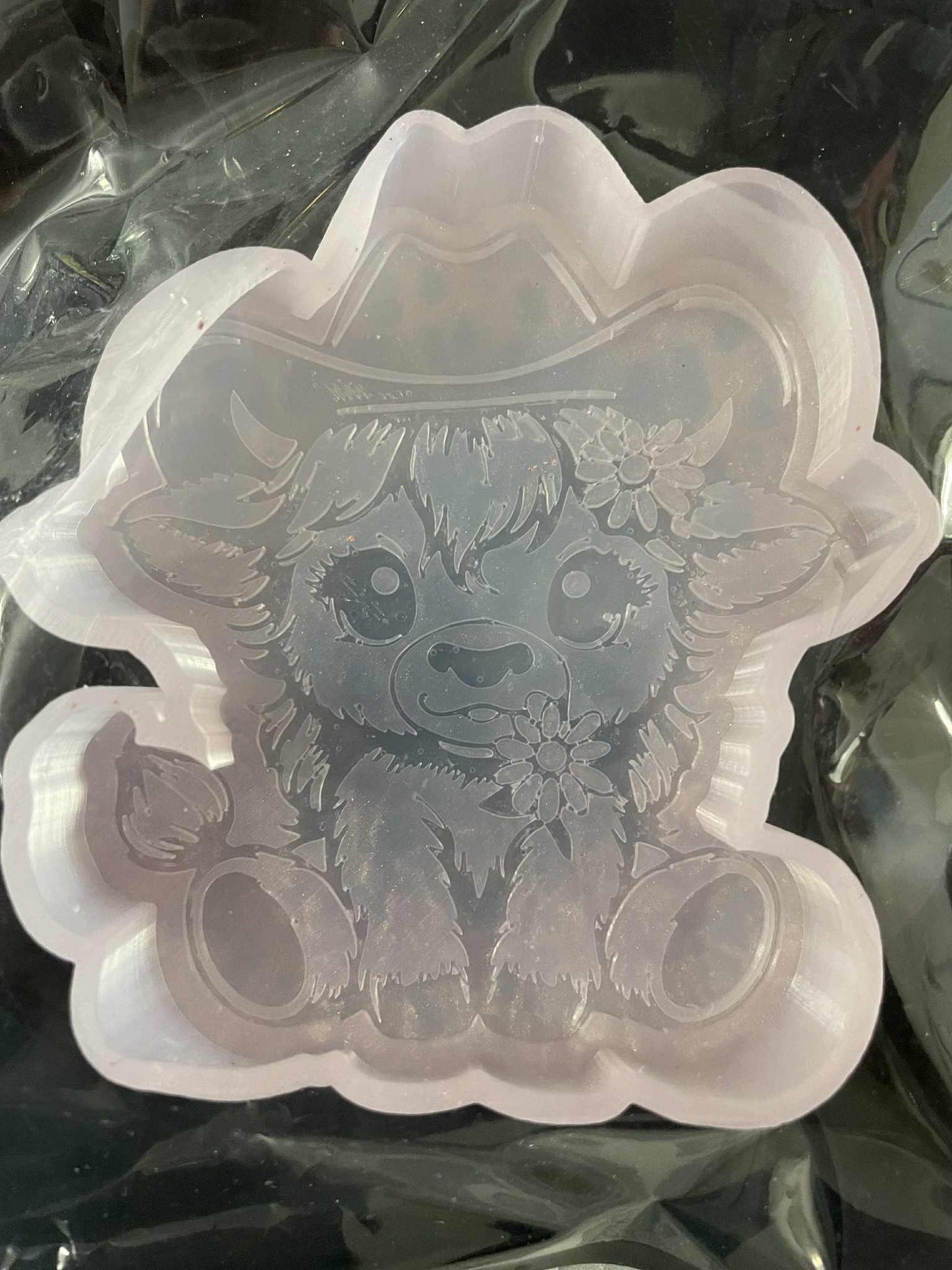 Highland cow with hat and flower car freshie mold